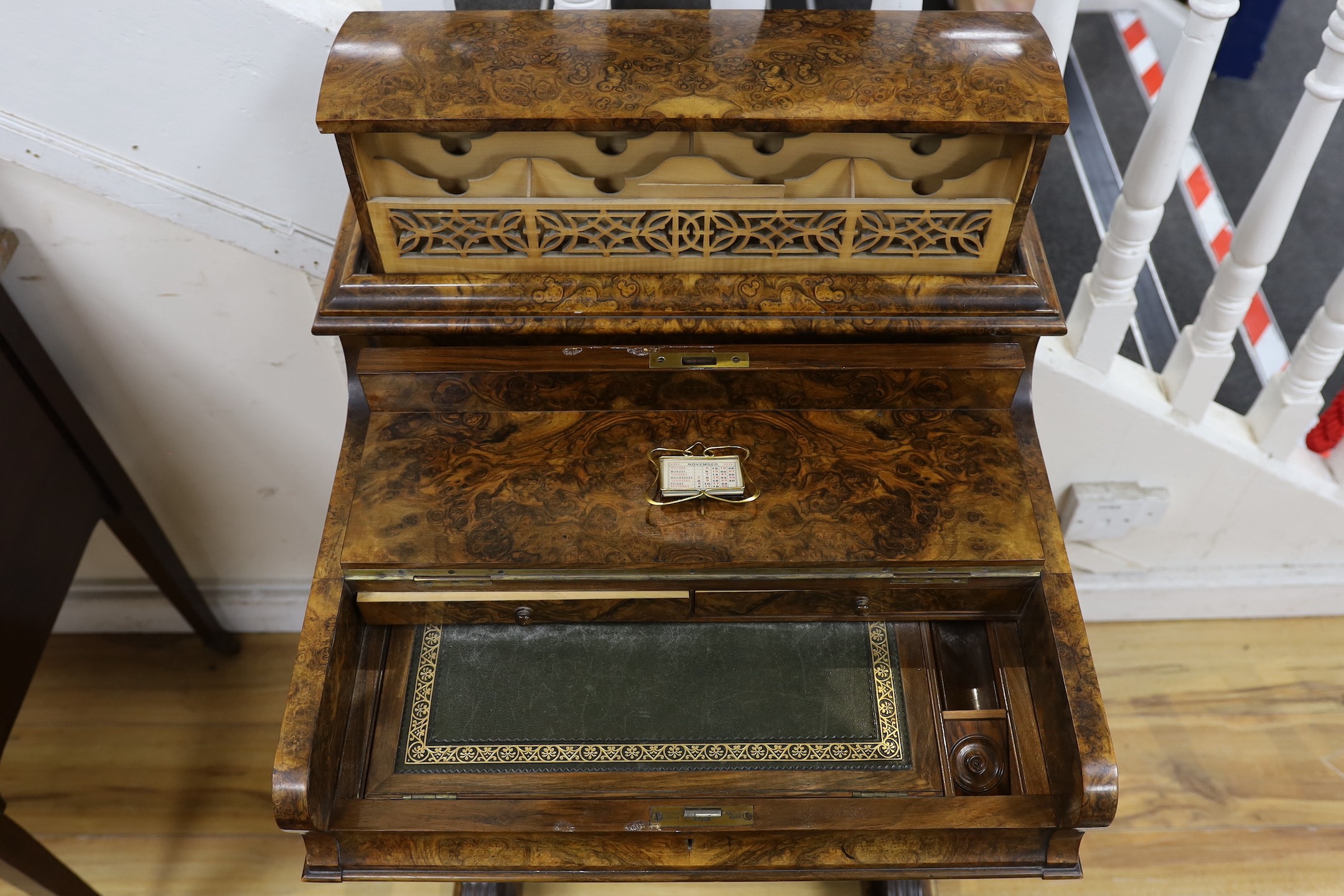 A late Victorian Maple & Co. burr walnut pop-up Davenport, width 59cm, depth 56cm, height 104cm